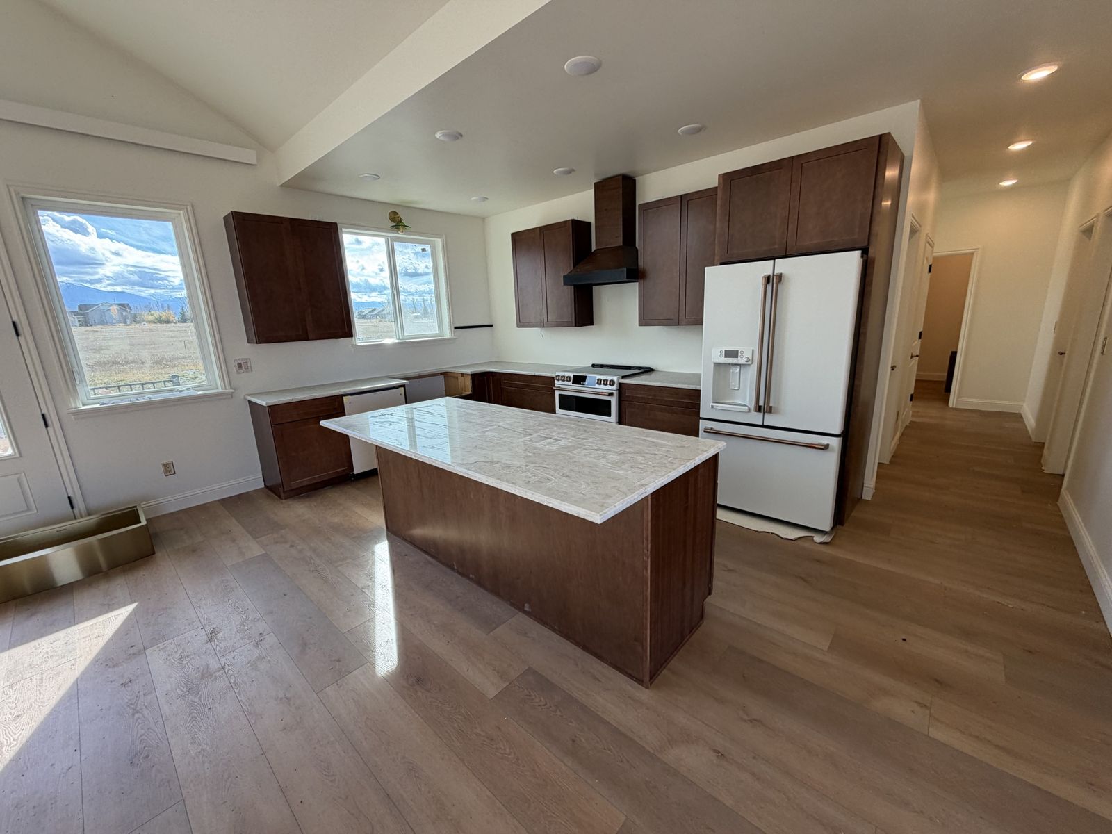Kemper cabinets with luxury vinyl plank flooring in a Star Valley kitchen